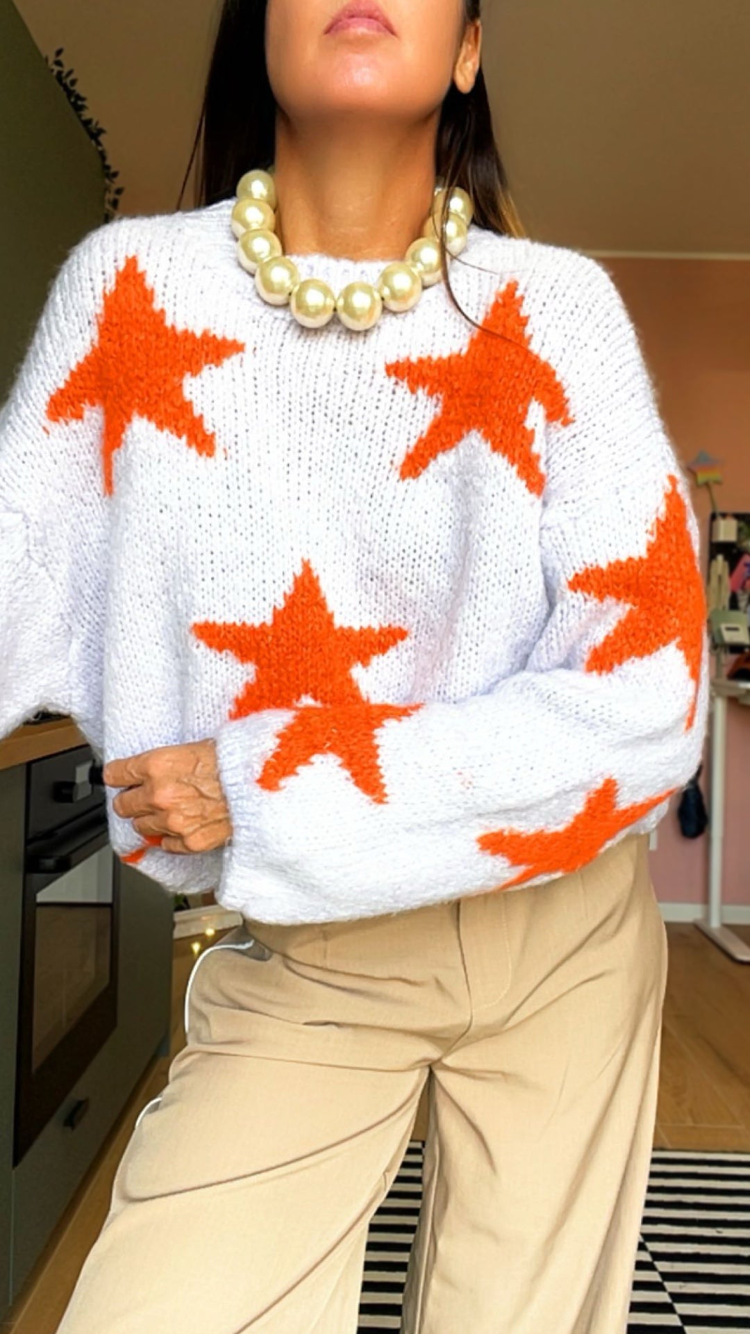 Pull RORY stelle lilla/arancio