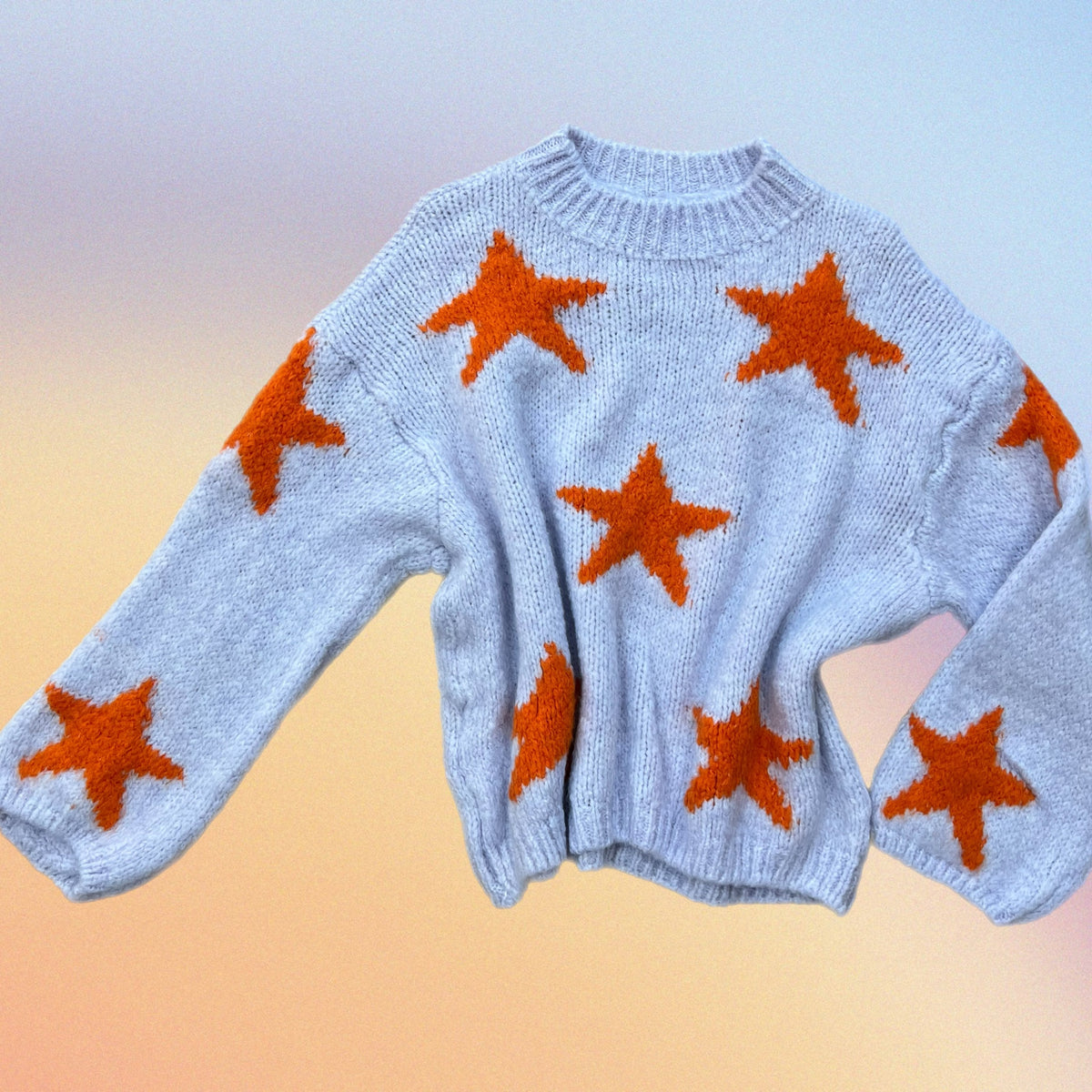 Pull RORY stelle lilla/arancio